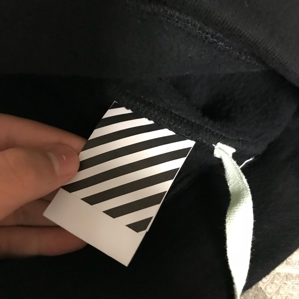 Off white watches over hoodie